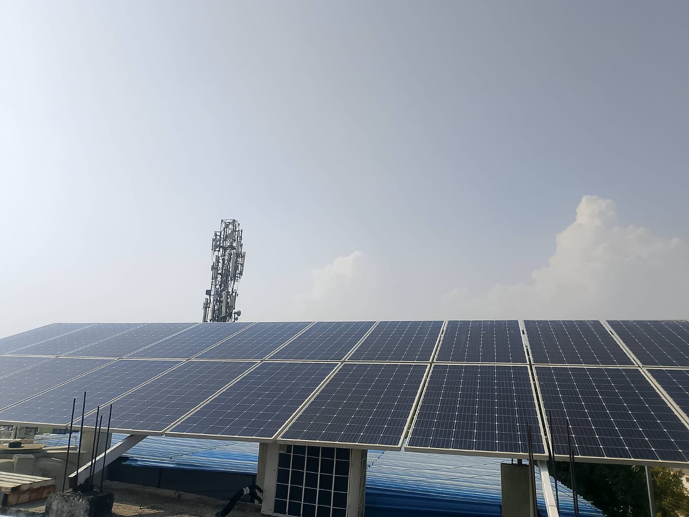 Elevated rooftop solar panel array installed by PK Solar